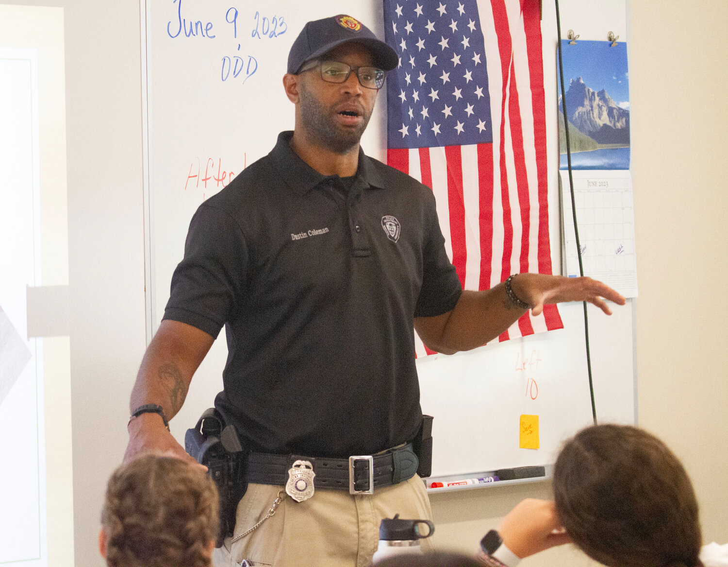 Brown University Police Officer Dustin Coleman speaks with Barrington Middle School students as part of seventh- and eighth-graders' Career Day.