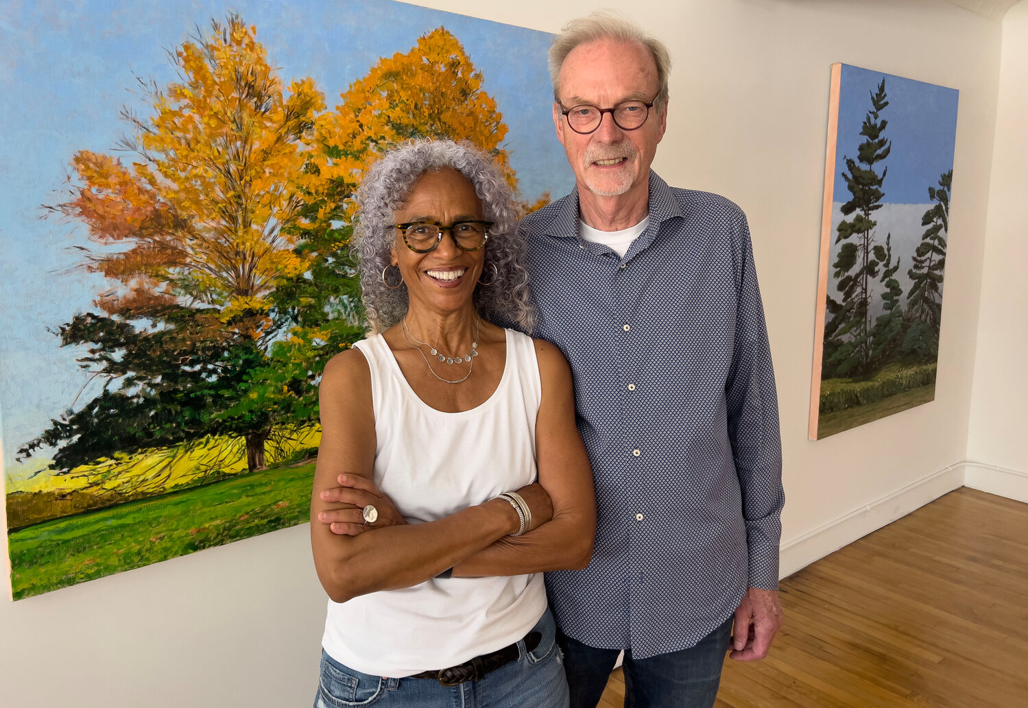 Artist Peter Devine and wife, Nancy, owner of Gallery 57 By The Bay. The gallery celebrated a grand opening this past weekend and the first exhibit features work from Peter.