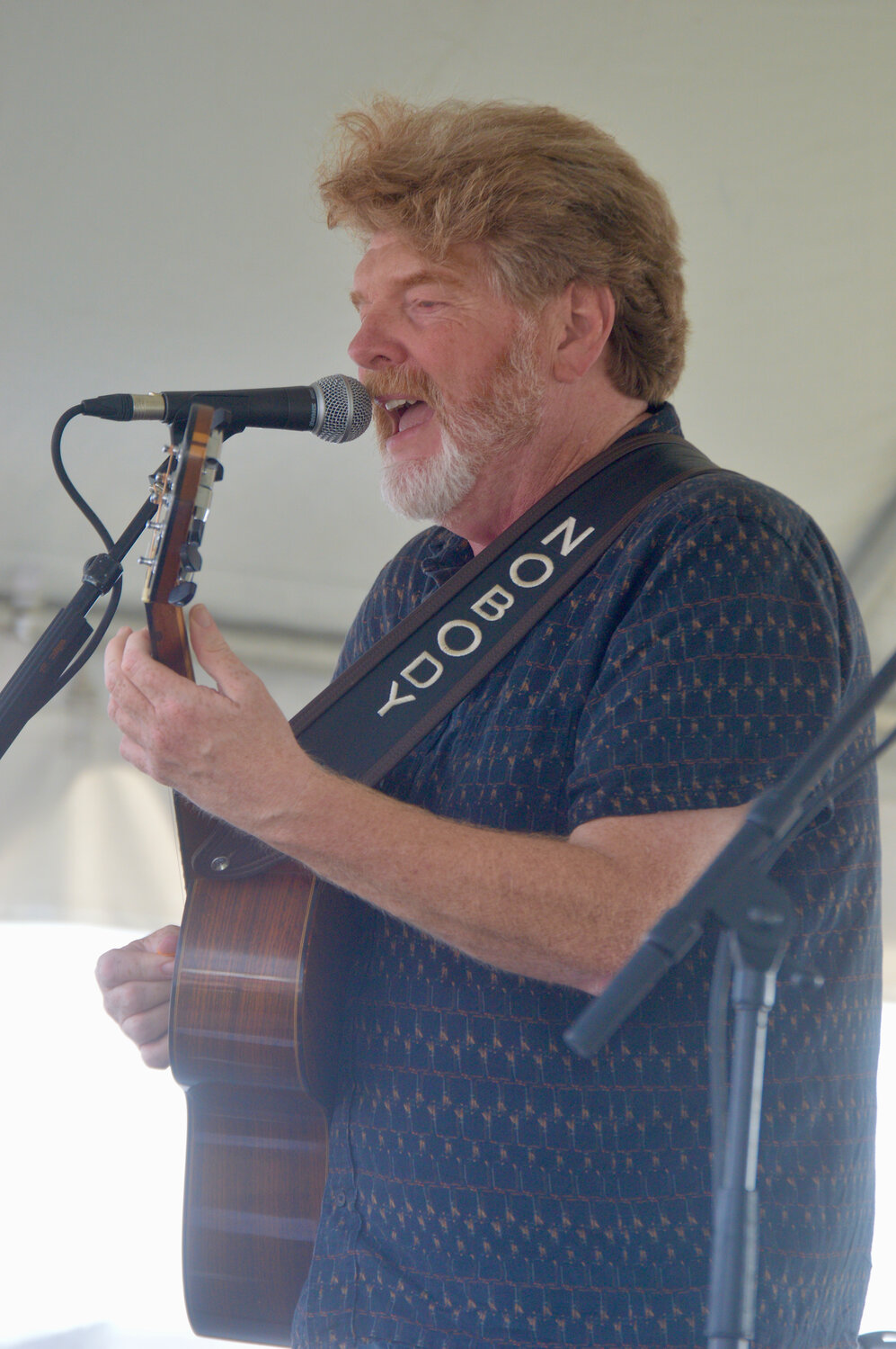 Mac McAnally performs before being joined on stage by Jimmy Buffett.