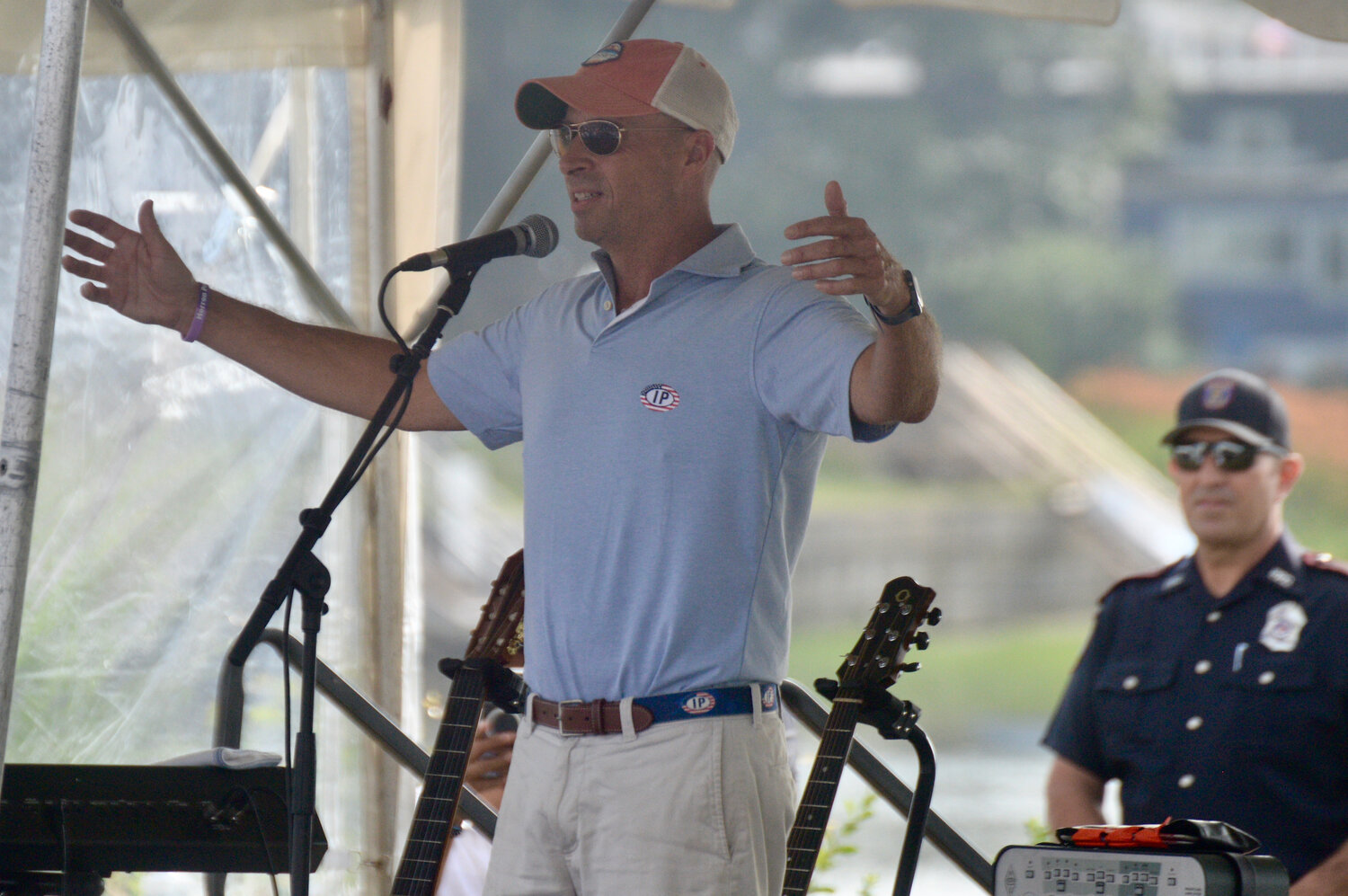 Mike MacFarlane, the owner of Sunset Cove who was celebrating his 50th birthday, introduces Mac McAnnally to the crowd.