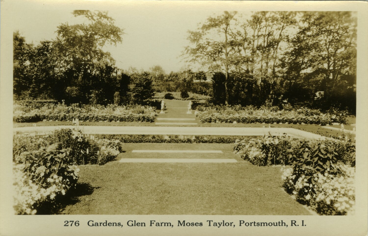 The gardens outside the Glen Manor House are the subject of this vintage postcard.