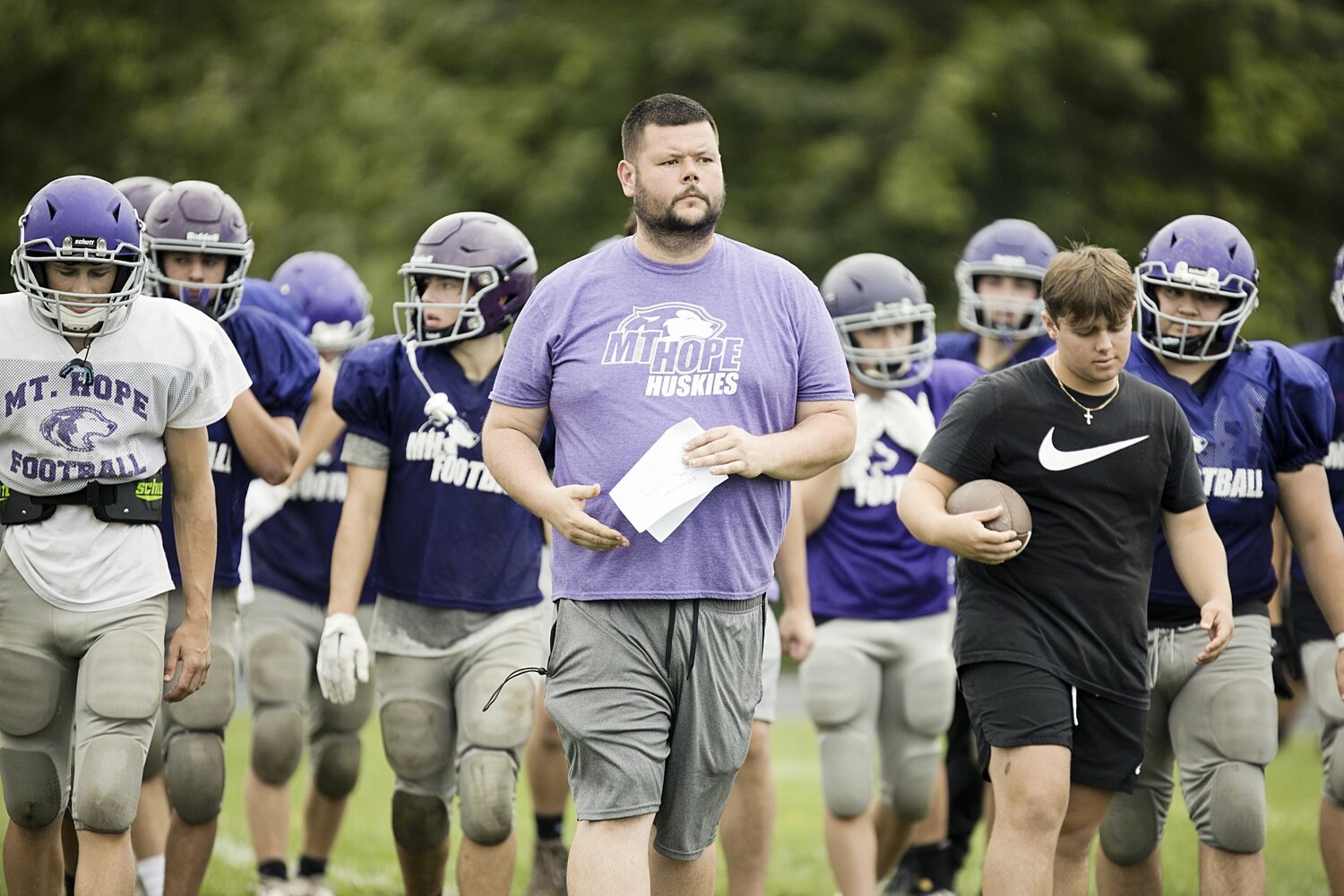 Shane Parker and the Huskies ready for practice during a scrimmage on Saturday.