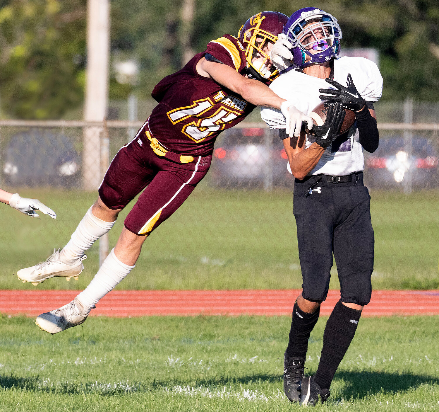 Huskies defensive back Lucas Andreozzi hauls in a Ben Troia pass for an interception in the second quarter.