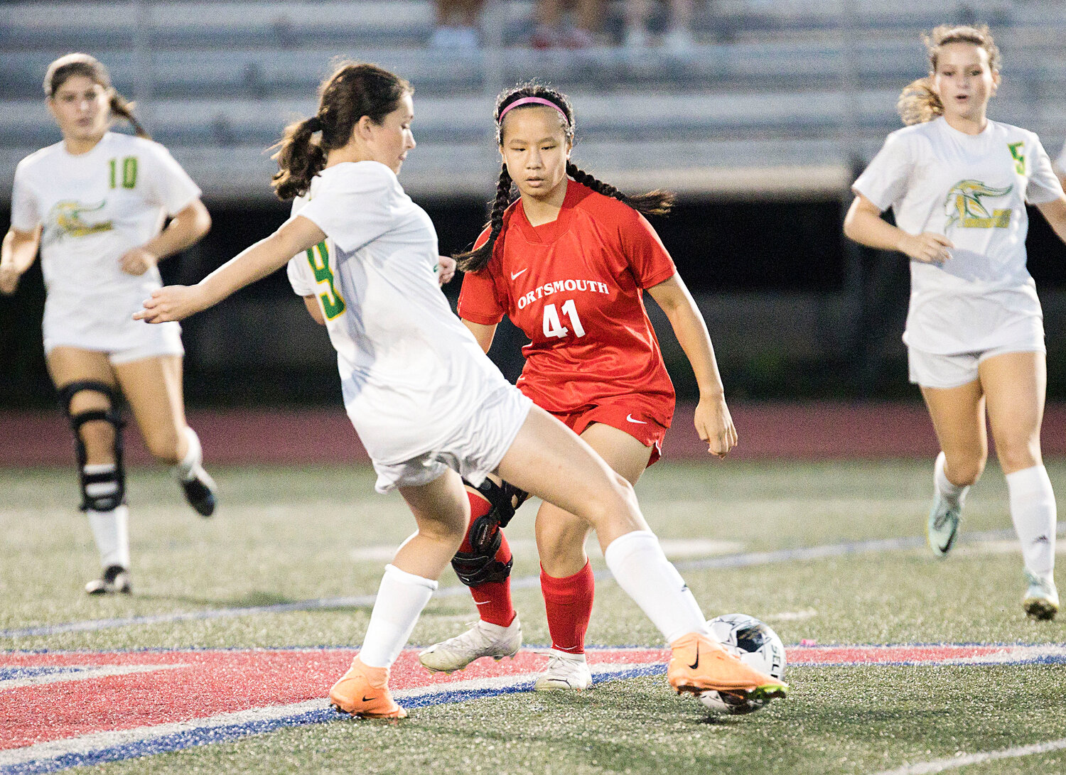 Elena Sun pressures a North Smithfield defender early, in the first half of Tuesday’s game.