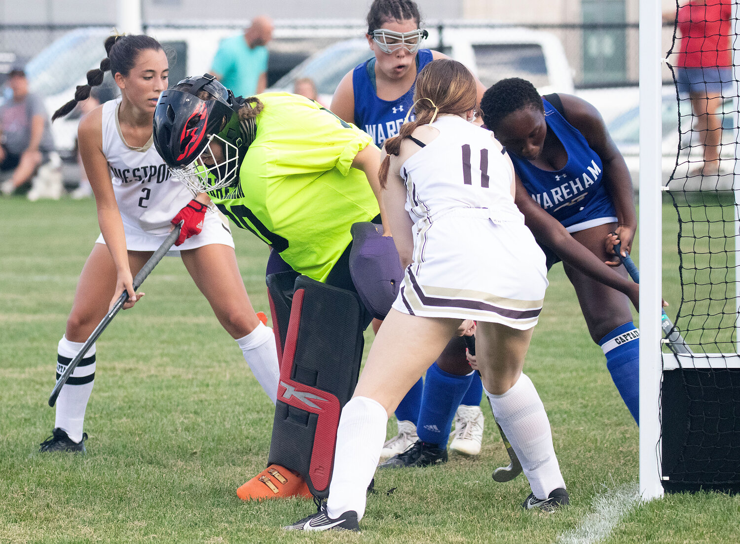 Avery Avila (left) and Cailynn White attempt to stuff the ball into the goal.