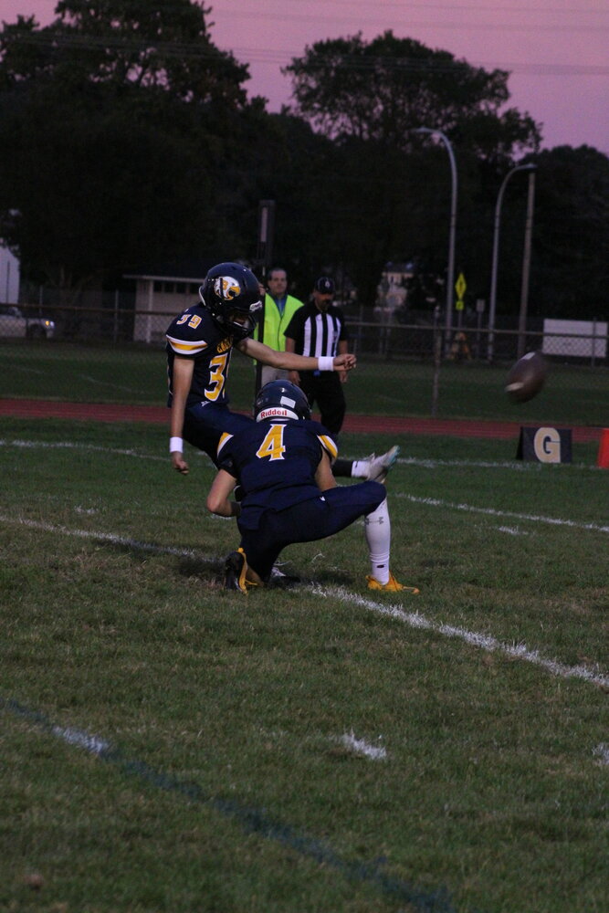 Ben Aree boots an extra point for the Eagles on Friday night.