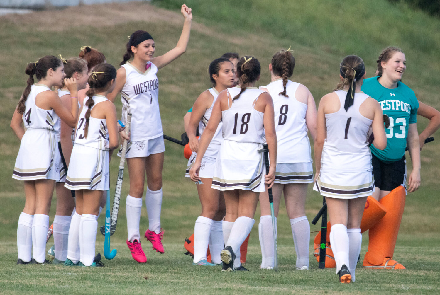 Molly Costa (mid-left), goalkeeper Hannah Abrams and the the Wildcats celebrate after the win. 
