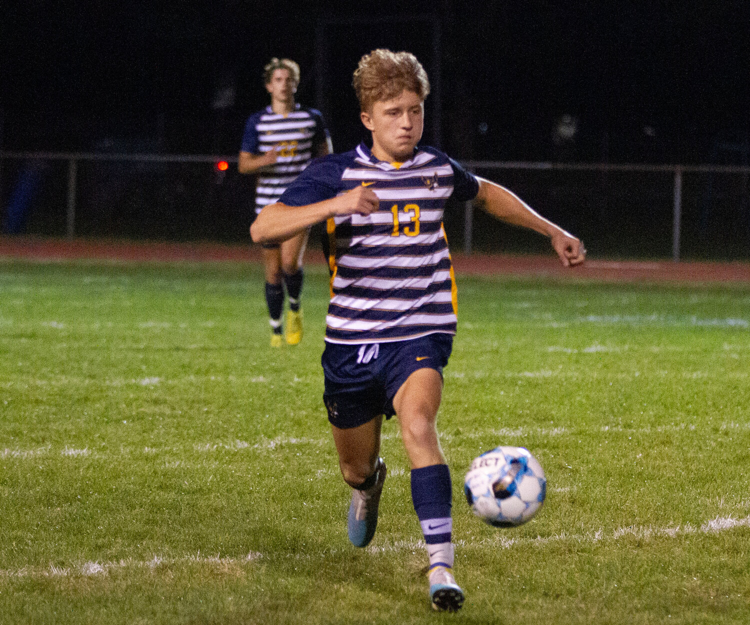 Barrington’s Colin Hope dribbles the ball up the field during the Eagles’s 3-0 win over Mt. Hope on Thursday night.