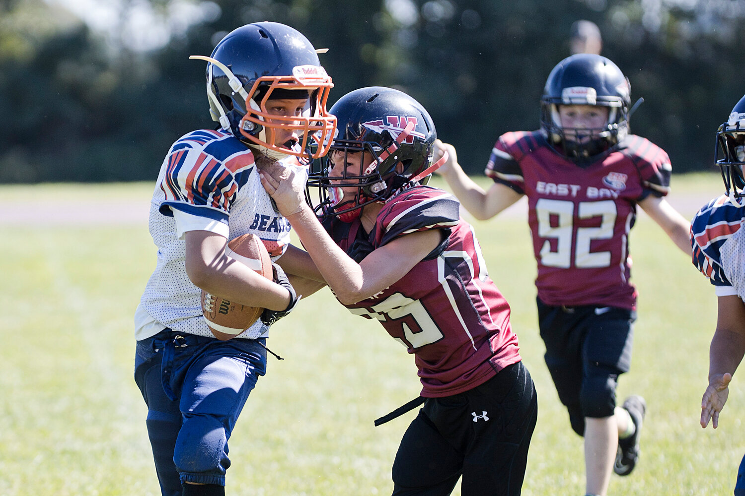 10U's Cohen Emard stops a New Bedford running back from advancing the ball. 