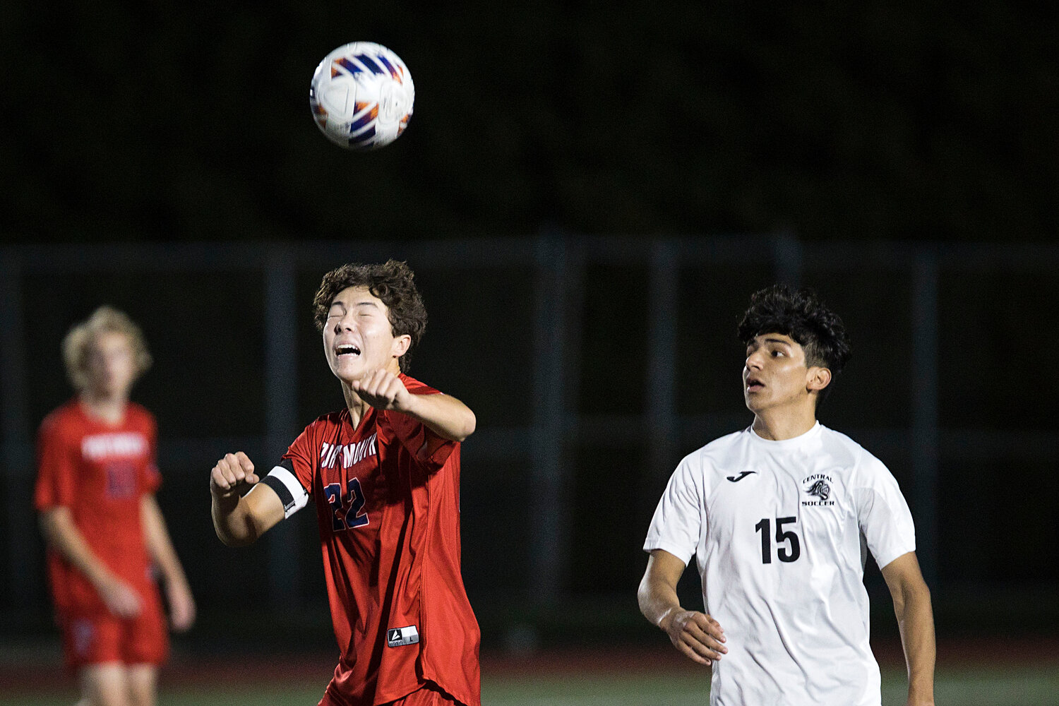 Portsmouth’s Aidan Chen uses his head to settle a pass while battling Central High School at home on Tuesday night.