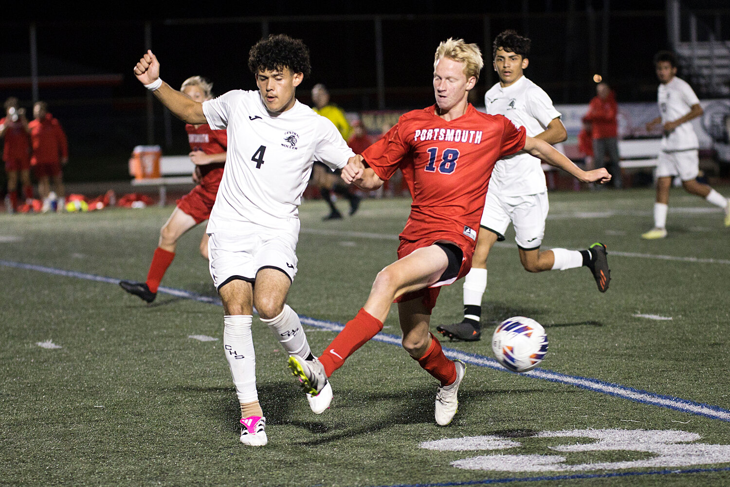 Nathaniel DeConto beats a Central opponent to the ball.