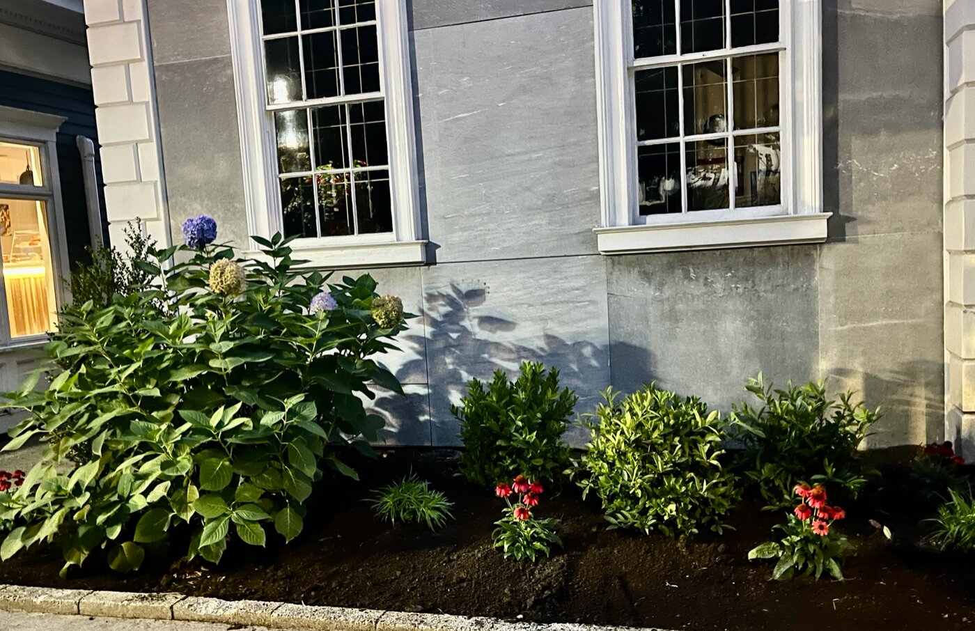 "What had previously had the aesthetics of the vegetation next to an I-95 off-ramp was now a stately, pristine garden that complimented the organization's work at the neighboring Rogers Free Library."