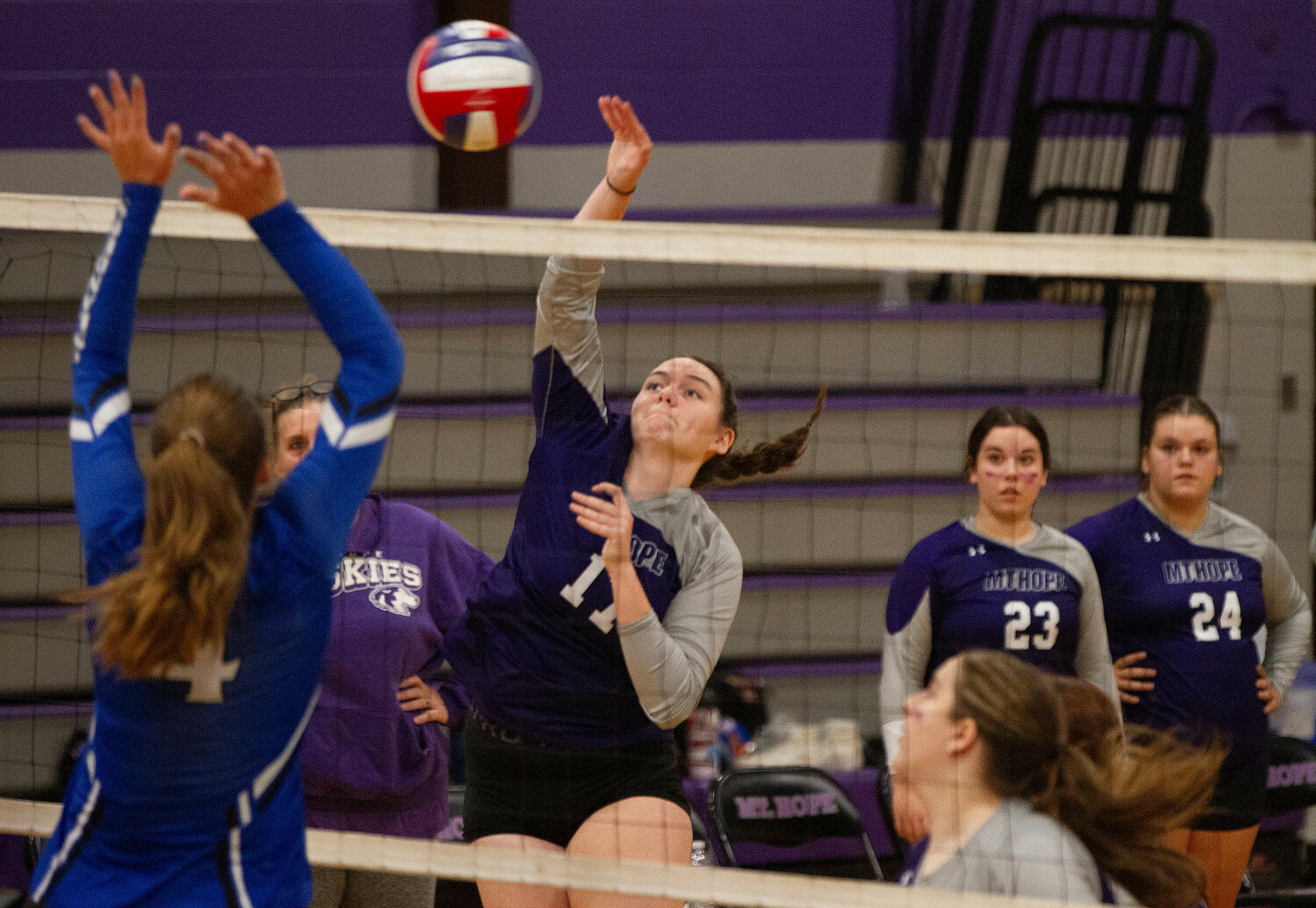 Mary Gerhard elevates to hit a spike.