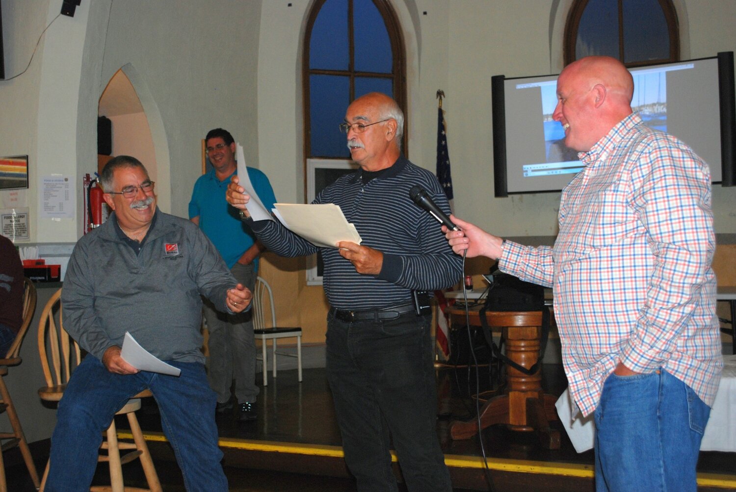 It was a fun-filled night at VFW Hall Saturday night when recently retired Jim Vieira (far left) was "roasted" by fellow Bristol Fire Department colleagues Lou Mascola (center) and Rick Giannini.
