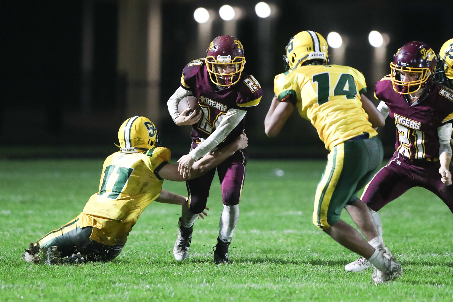 Running back Evan Lapointe is tackled during the game.