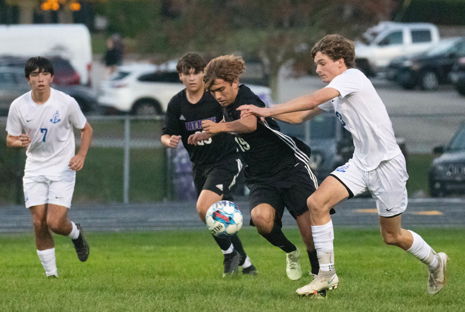 Maddox Canario Dribbles up field with teammate Dylan DeOliveira looking on.