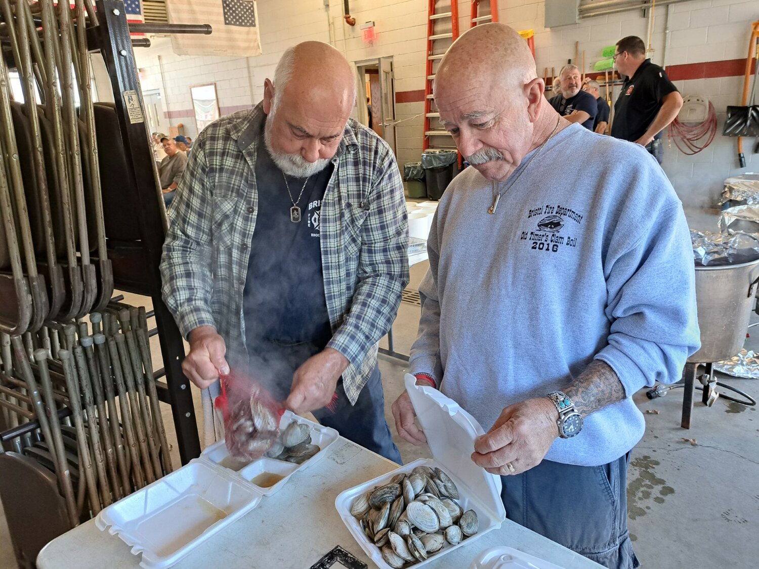 Joe DaRosa (left) and Paul Vollaro were busy putting things together for the annual Bristol Fire Dept. Old-Timers Clamboil Friday afternoon.