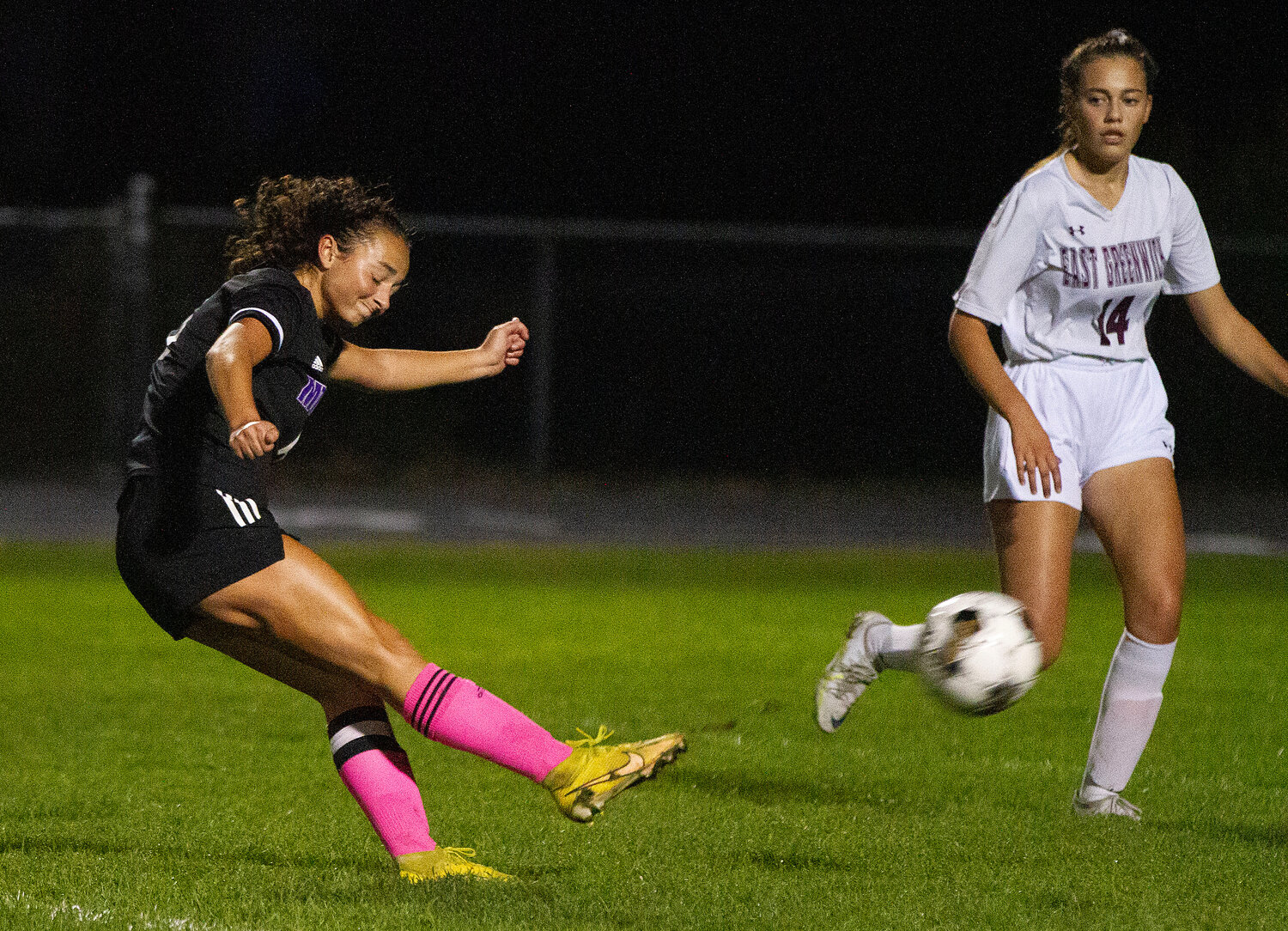 Caitlyn Terceiro (left) blasts a shot on goal from 30 yards out. The ball looped over the goalkeeper's head for a goal. 