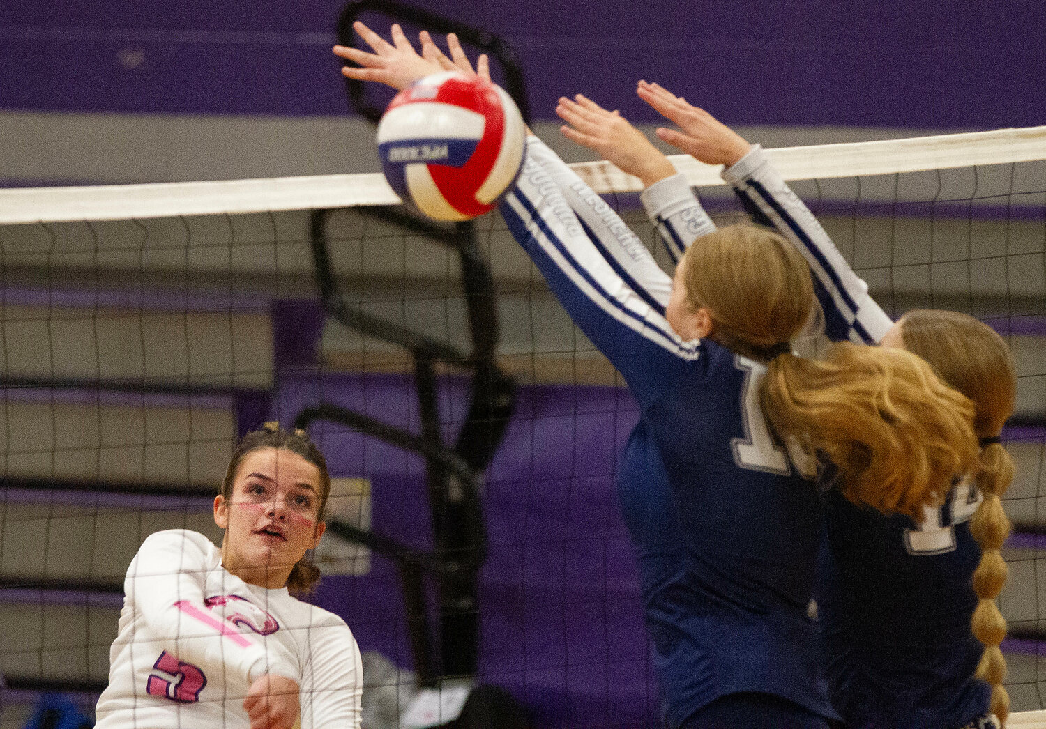 Sophomore hitter Sarah Wilcox blasts a kill by Westerly defenders.