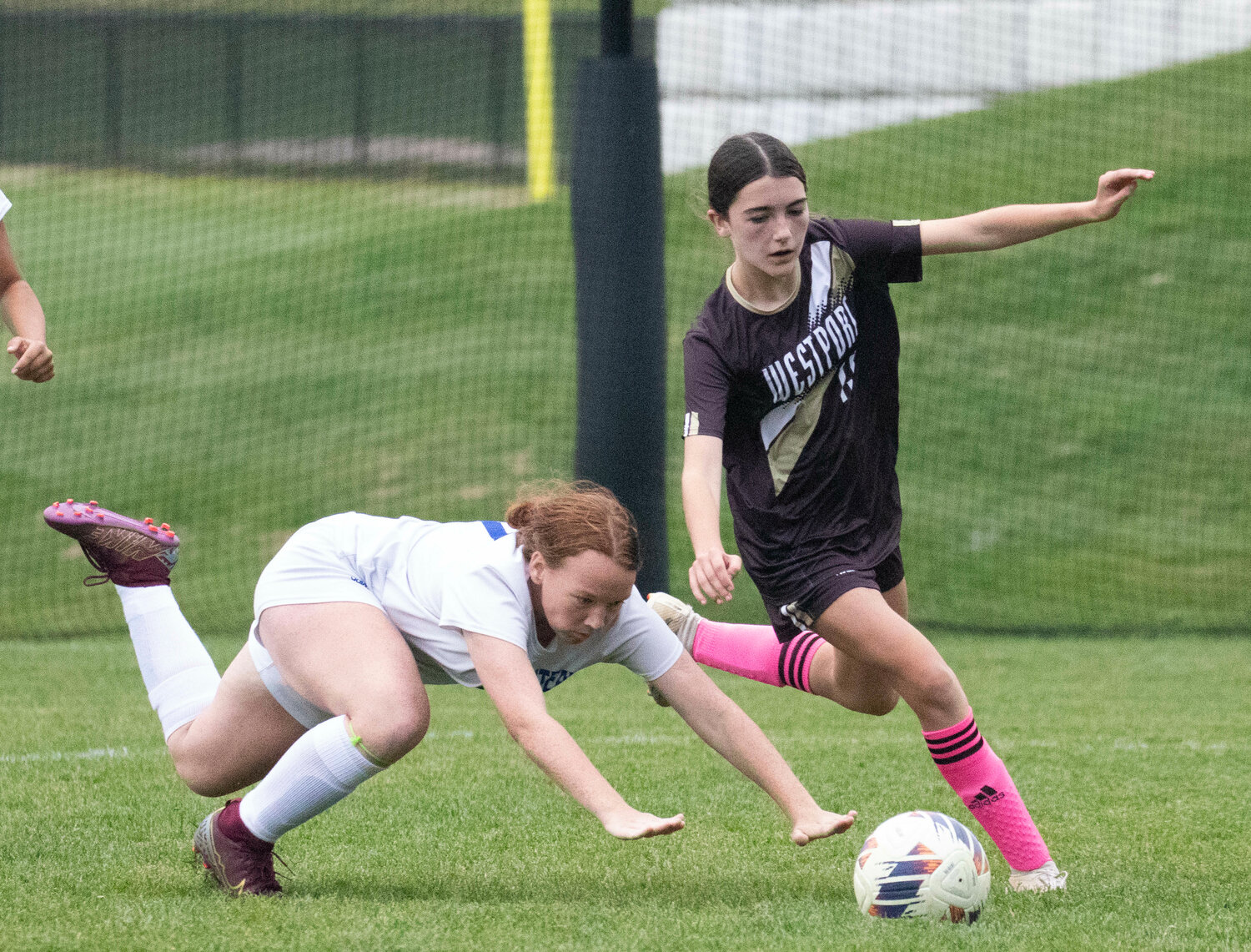 Sophia Nickelson dribbles around a Southeastern defender after collecting a pass from Harper Thibodeau.
