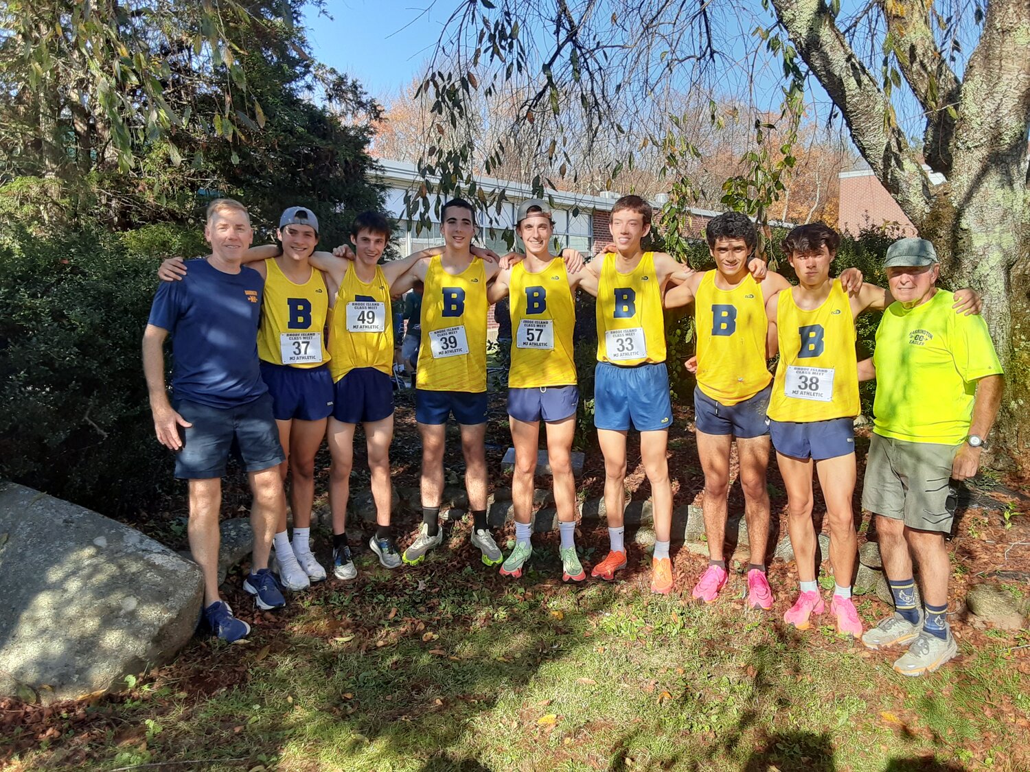 Members of the BHS boys cross country team pose for a photo after winning the Class B Championship on Saturday.