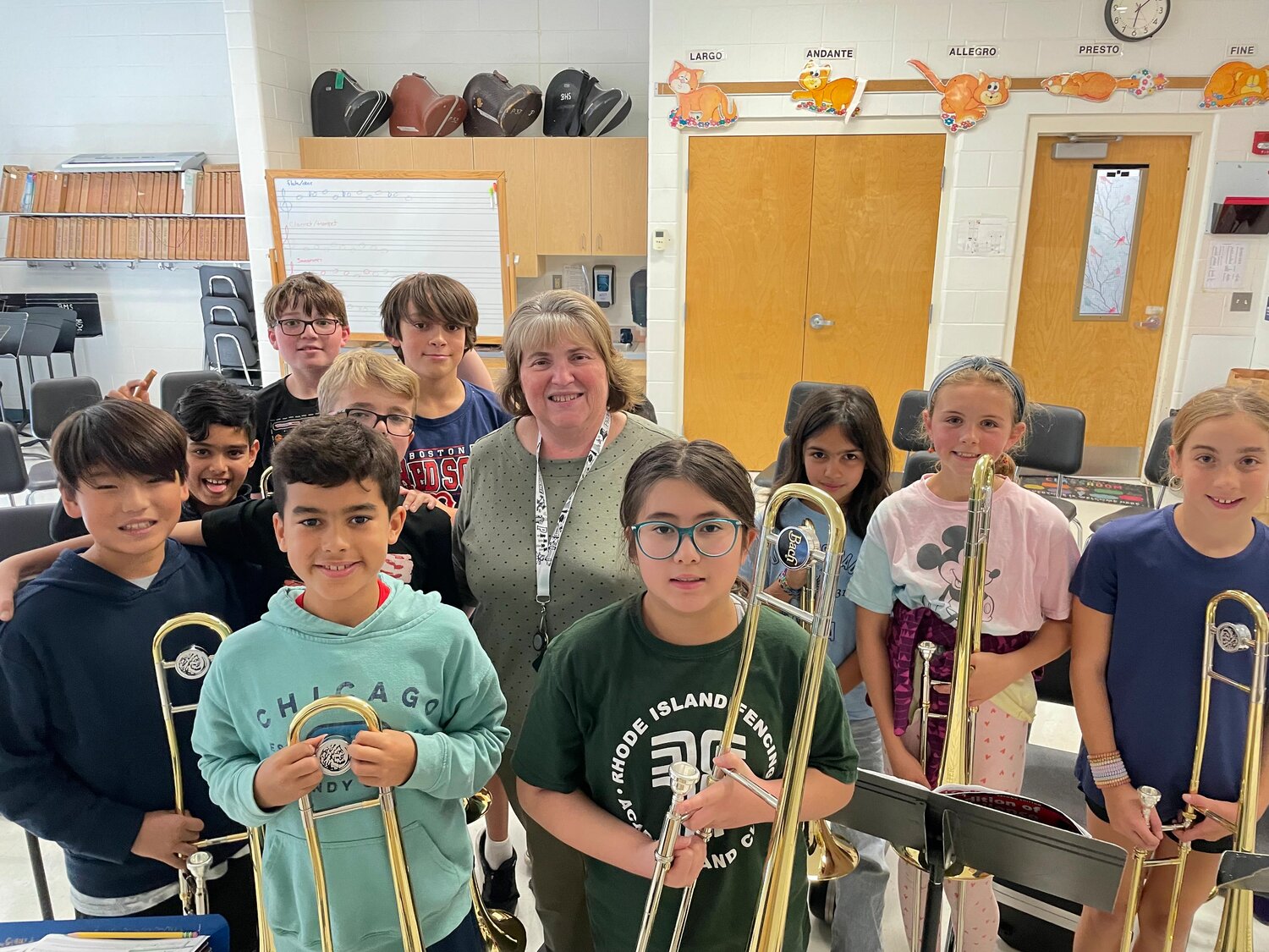 Mrs. Degnan is the band teacher at Hampden Meadows School. Here, she is pictured with some of the students in band.