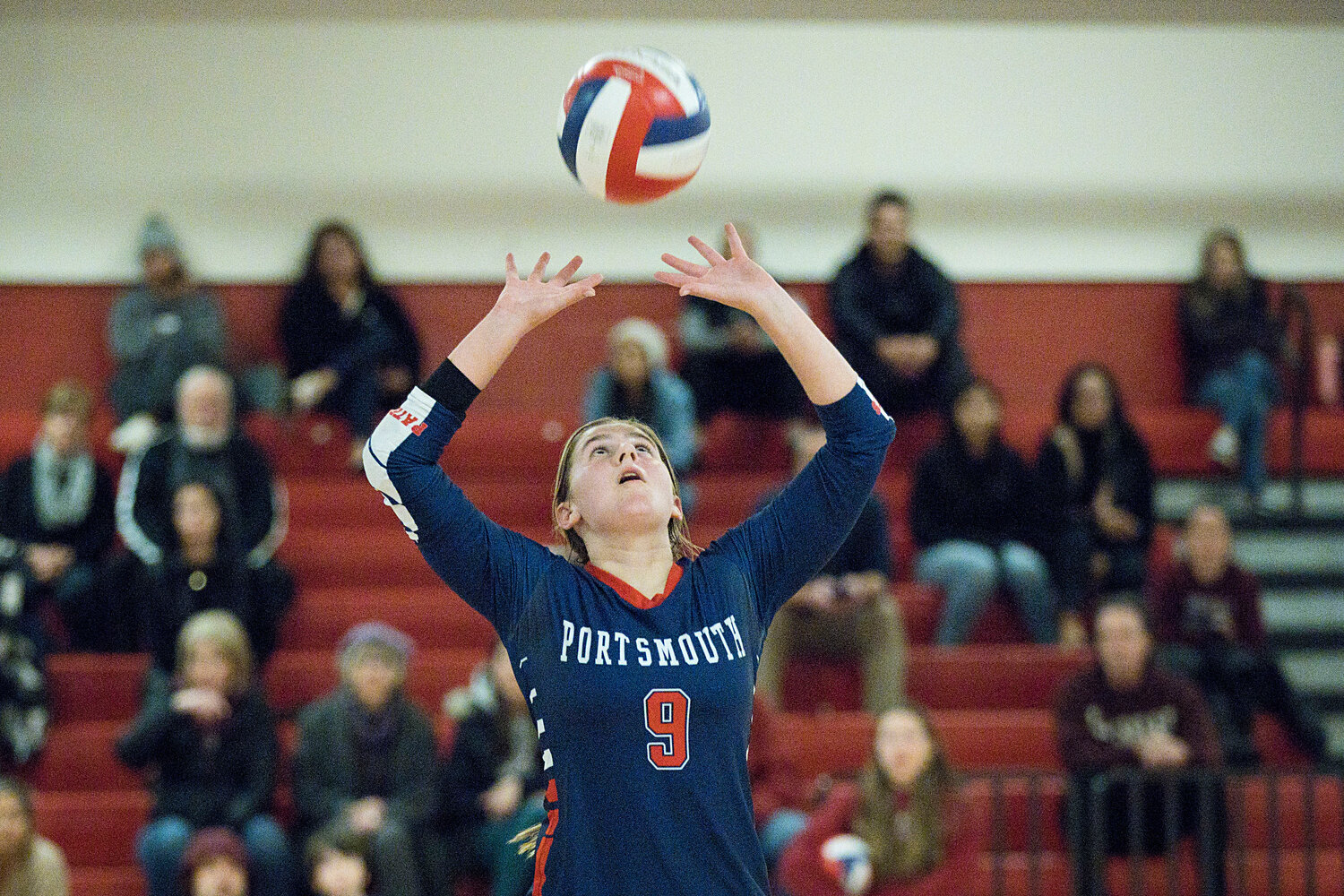 Caitlin Mediate sets the ball to a teammate.
