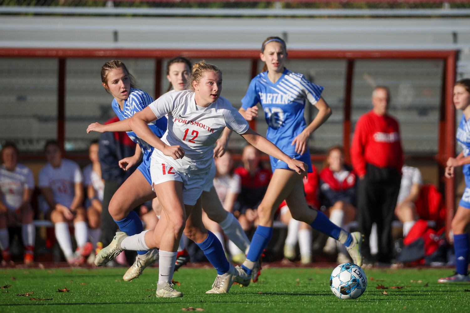 Mollyanne McGuire looks to get the ball to an open teammate upfield.