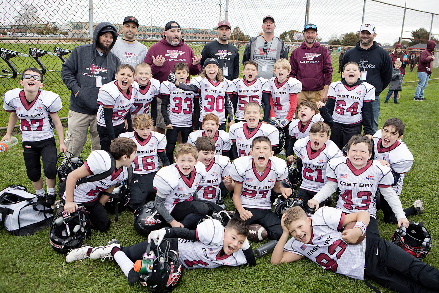 The 8U team celebrates an overtime victory against an undefeated Edgewood team in the semifinals on Oct. 29.