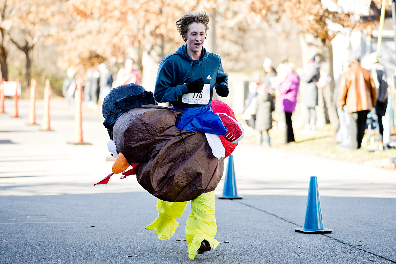 Barrington’s Sam Bishop runs toward the finish line of the 24th annual Trot Off Your Turkey 5K on Saturday. The event raises money for St. Luke’s School.