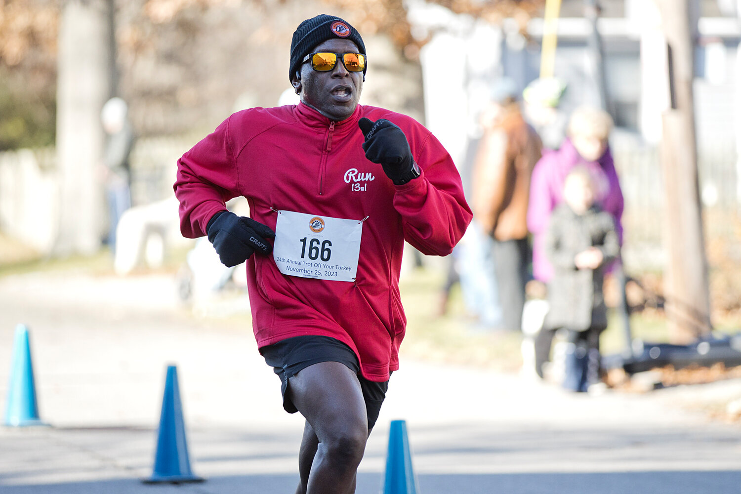 Dominic Herard, of Cranston, powers toward the finish line at the 24th annual Trot Off Your Turkey 5K.