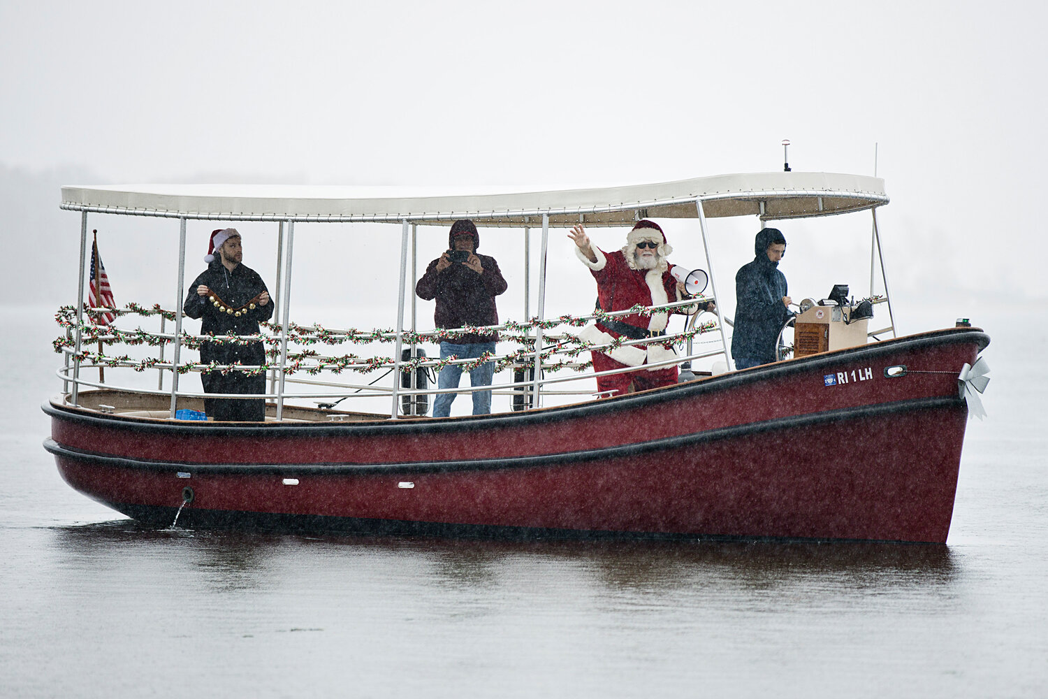 Santa Claus reached the shores at Sabin Point Park on a rainy Saturday morning, Nov. 18, aboard the "Lady Pomham II," the Friends of Pomham Rocks launch.