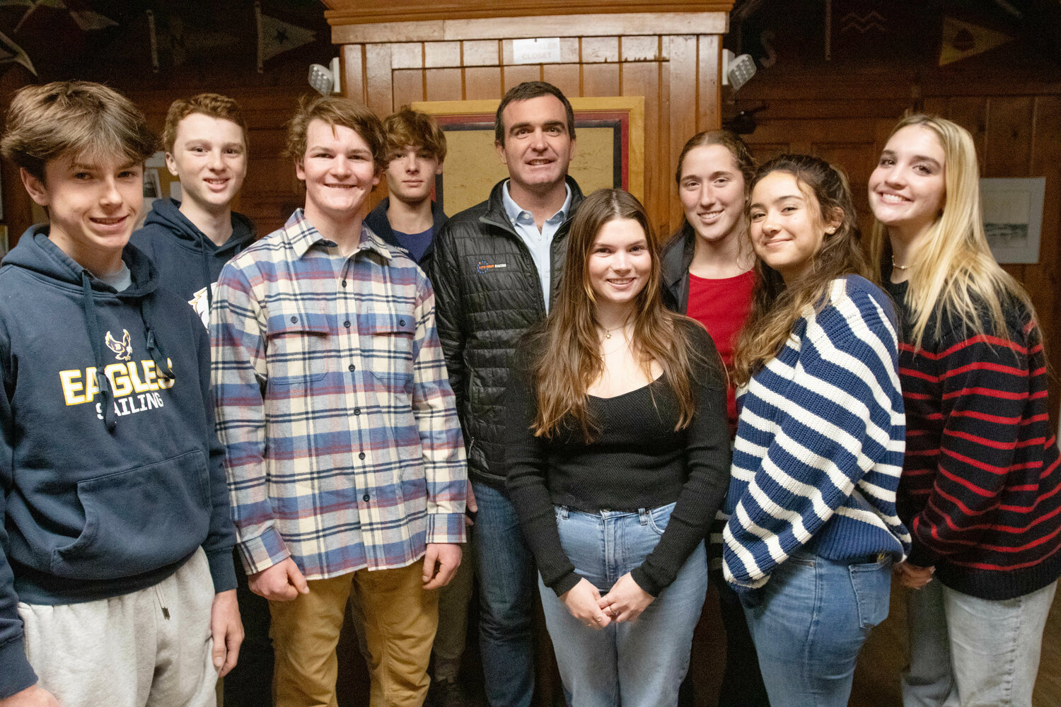 Members of the BHS sailing team pose for a photo with skipper Charlie Enright during a special event on Wednesday night, Nov. 29. Pictured are (from left to right) Duffy Macaulay, Jack Gaynor, Christopher Chwalk, Quin Schneider, Charlie Enright, Avery Guck, Abby Appleyard, Abby Guertler and Lauren Leonard.