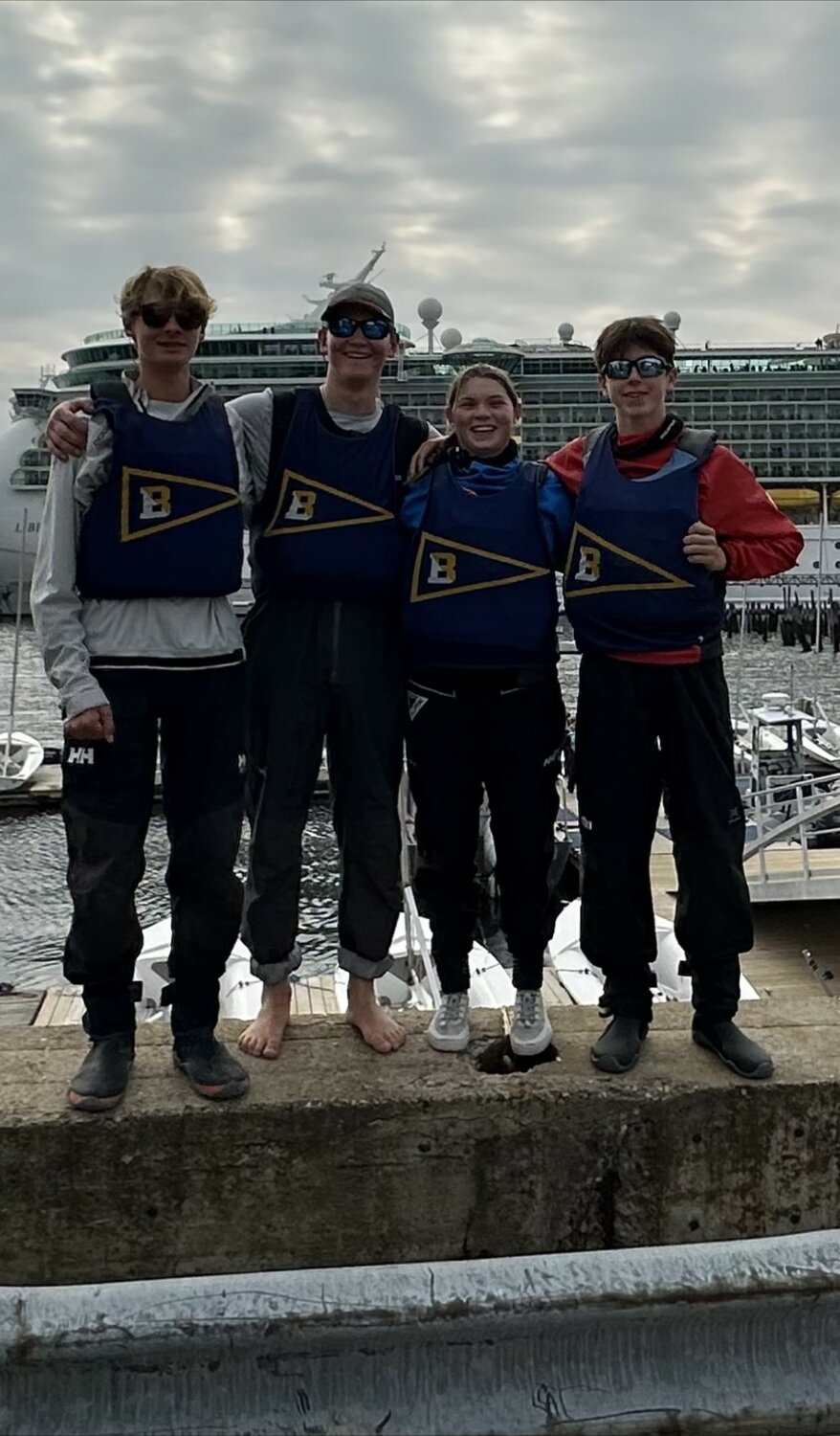 Barrington High School sailing team members Quin Schneider, Christopher Chwalk, Avery Guck and Duffy Macauley (from left to right) pose for a recent photo. Barrington will compete in the Keelboat Nationals next month.