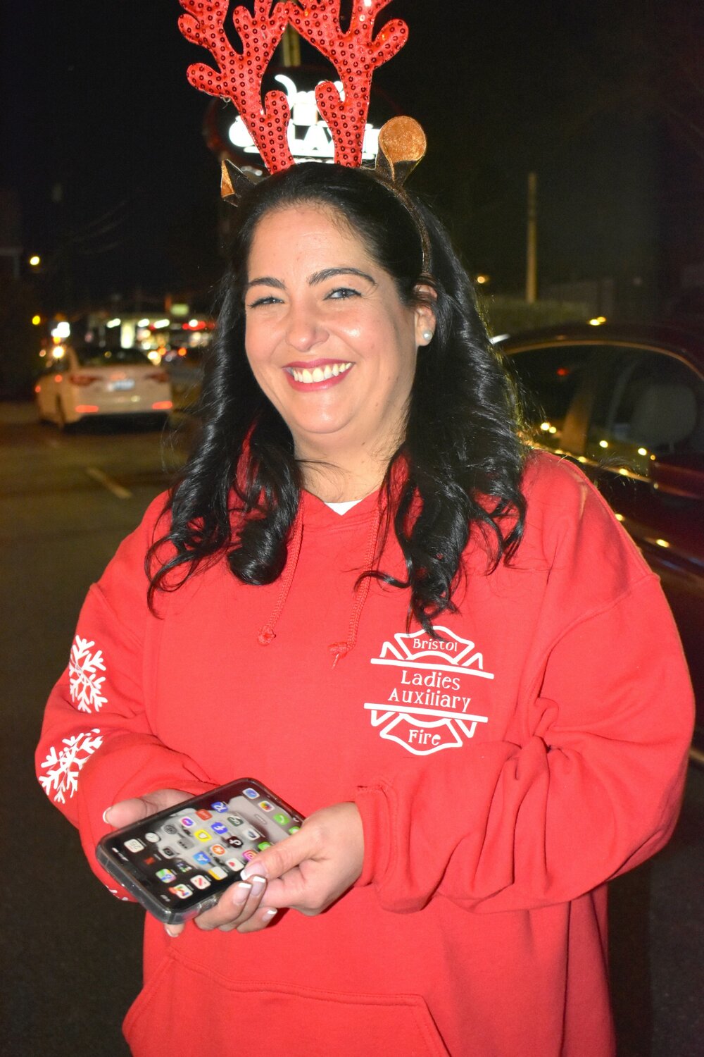 Jennifer Oliveira Mancieri was all smiles after another successful Kickoff to Christmas Community Aid Drive.