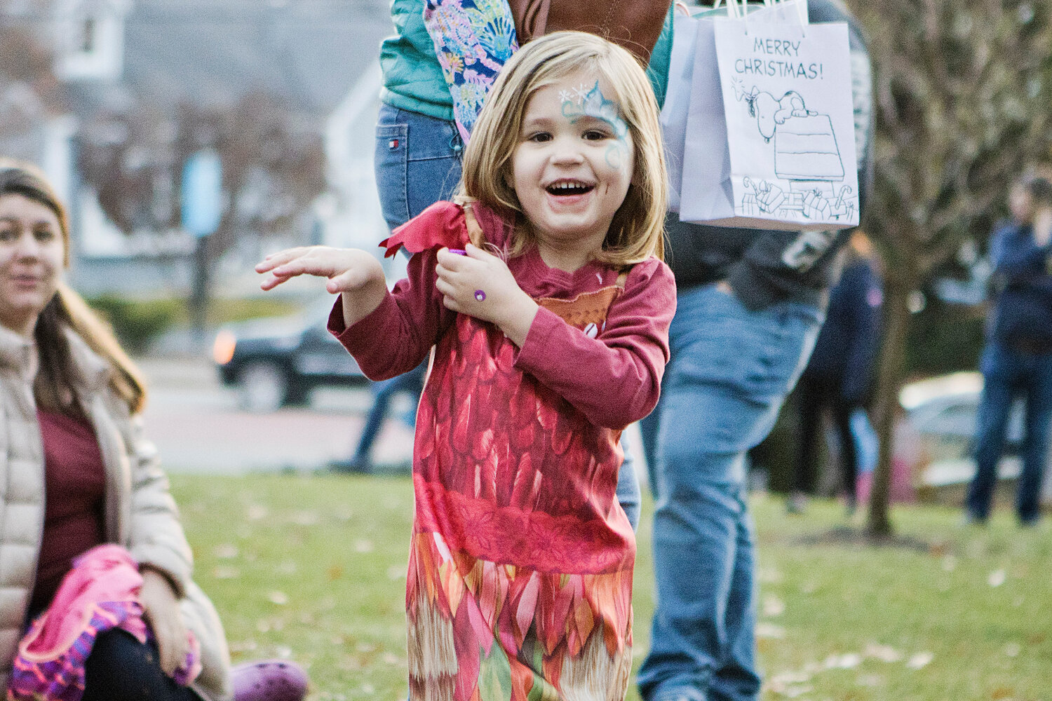 Rose Kennedy dances with excitement while waiting for Santa to arrive at the Barrington Town Hall, Saturday.