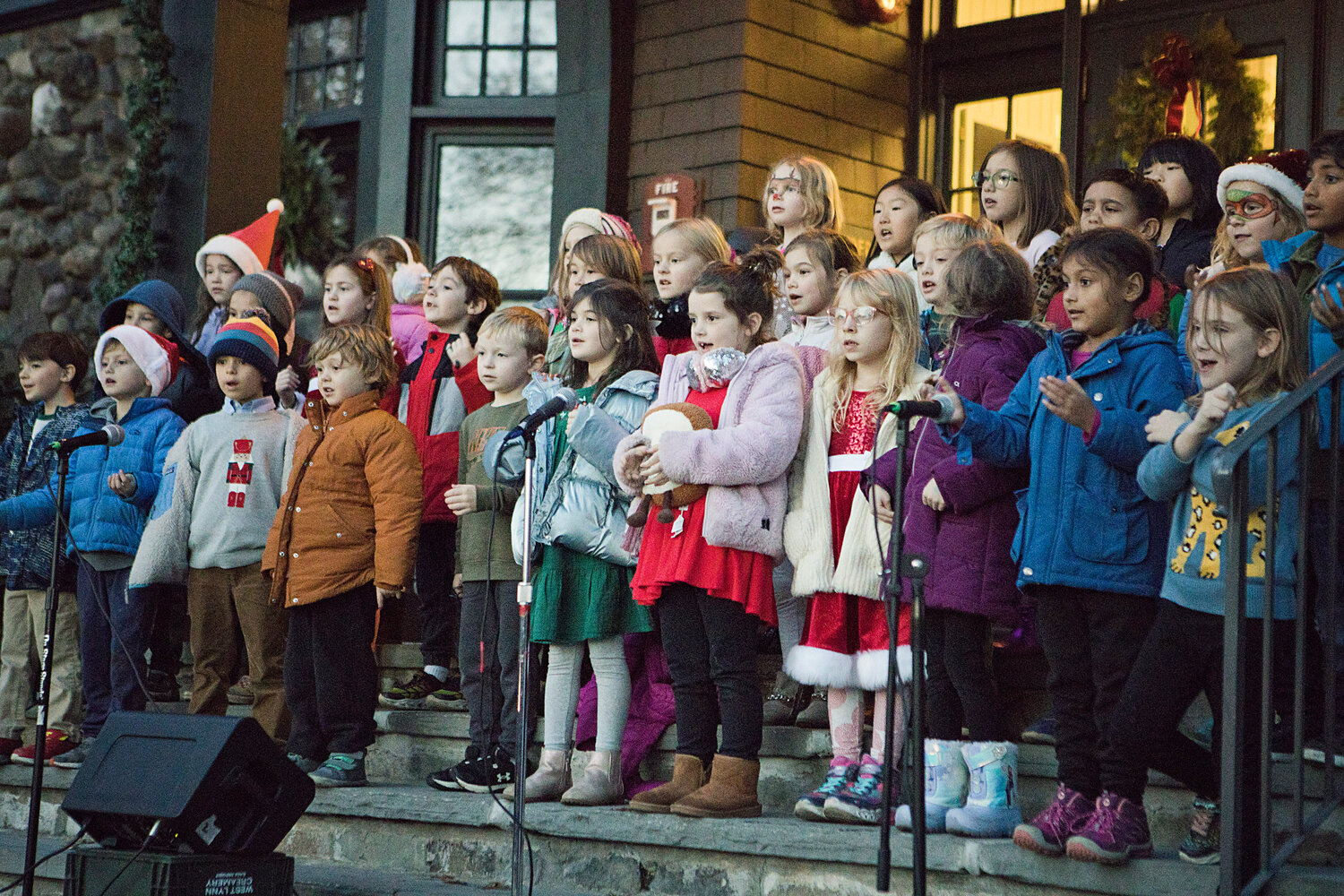 First grade students from Primrose and Sowams schools perform during Barrington's Tree Lighting ceremony, Saturday.