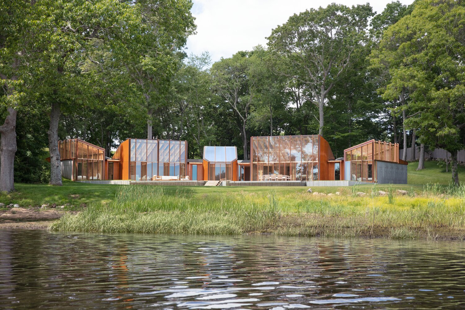 “The River House,” in Westport, Mass., as seen from the east branch of the Westport River. Designed and owned by architect Jonathan Levi, the house is a marvel of innovation, showcasing new ways of building and new ways of thinking about residential construction.