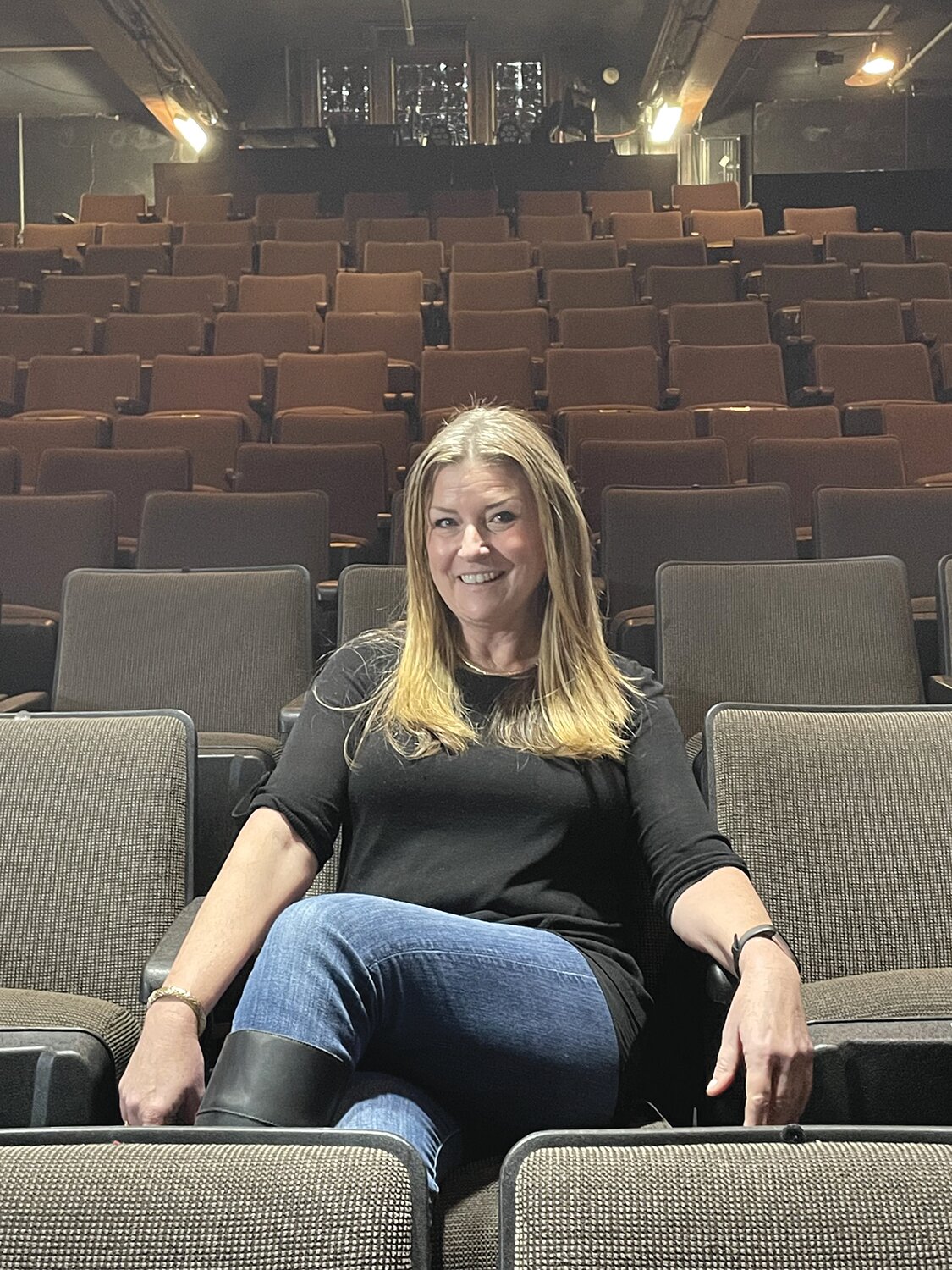 Dena Davis, co-founder and artistic director for Arts Alive!, is giddy about the possibilities for the newly renovated theater space at In Your Ear Records (formerly home to Second Story Theatre) in Warren.