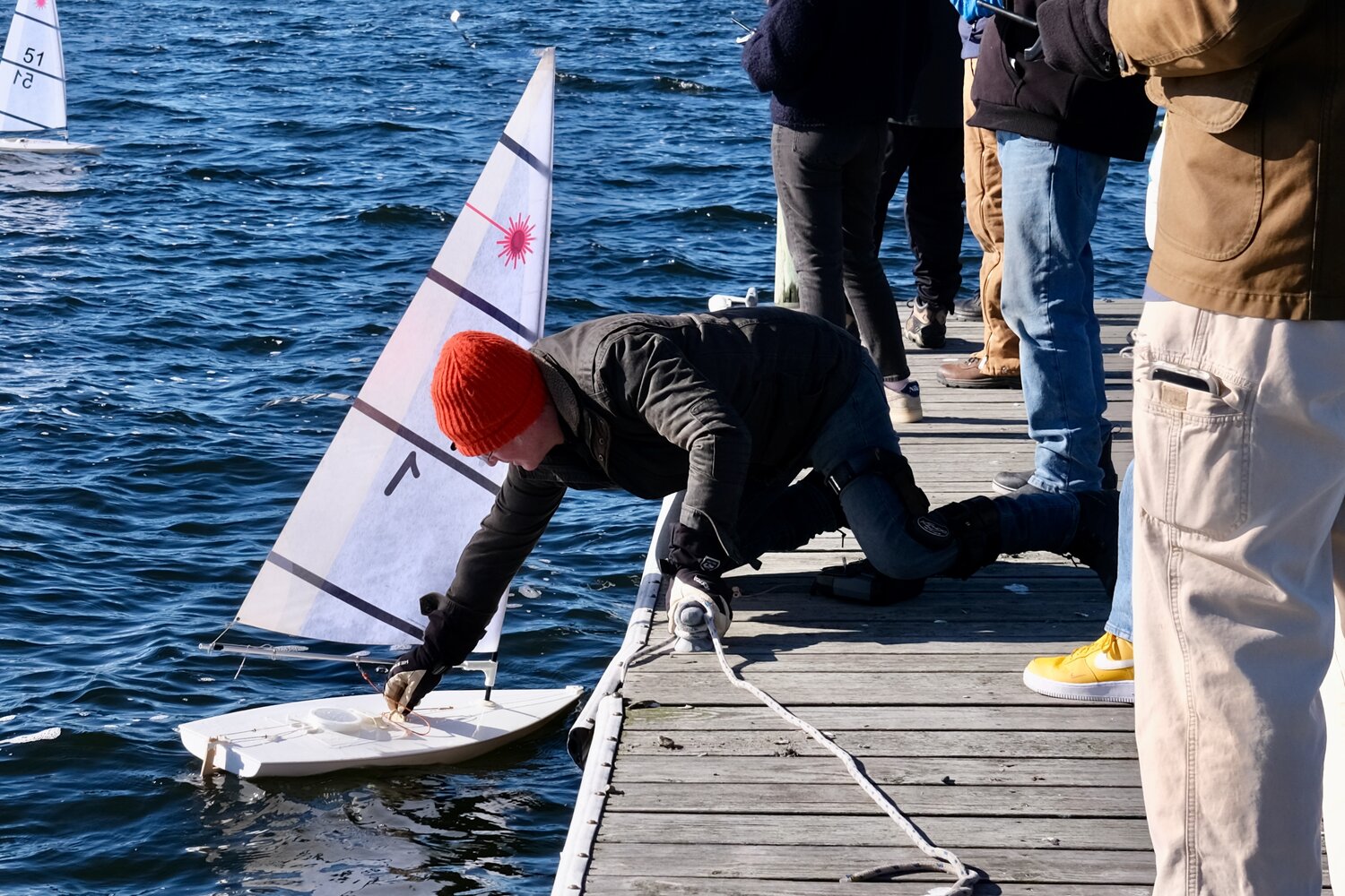 Matt Asaro makes an adjustment to his boat between races.