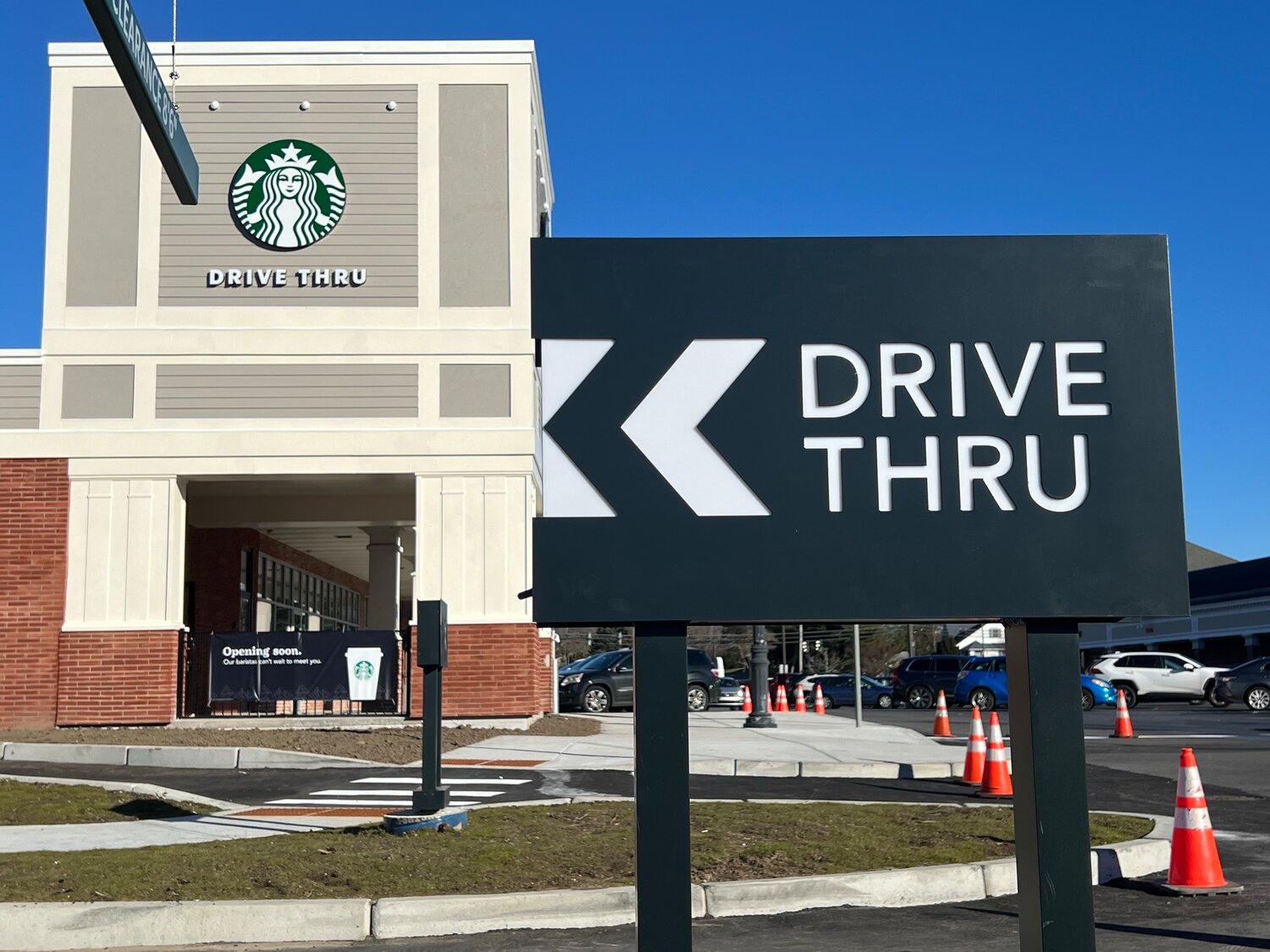 What will the drive-through lane at the new Starbucks mean to the Barrington Shopping Center? How will it impact traffic?