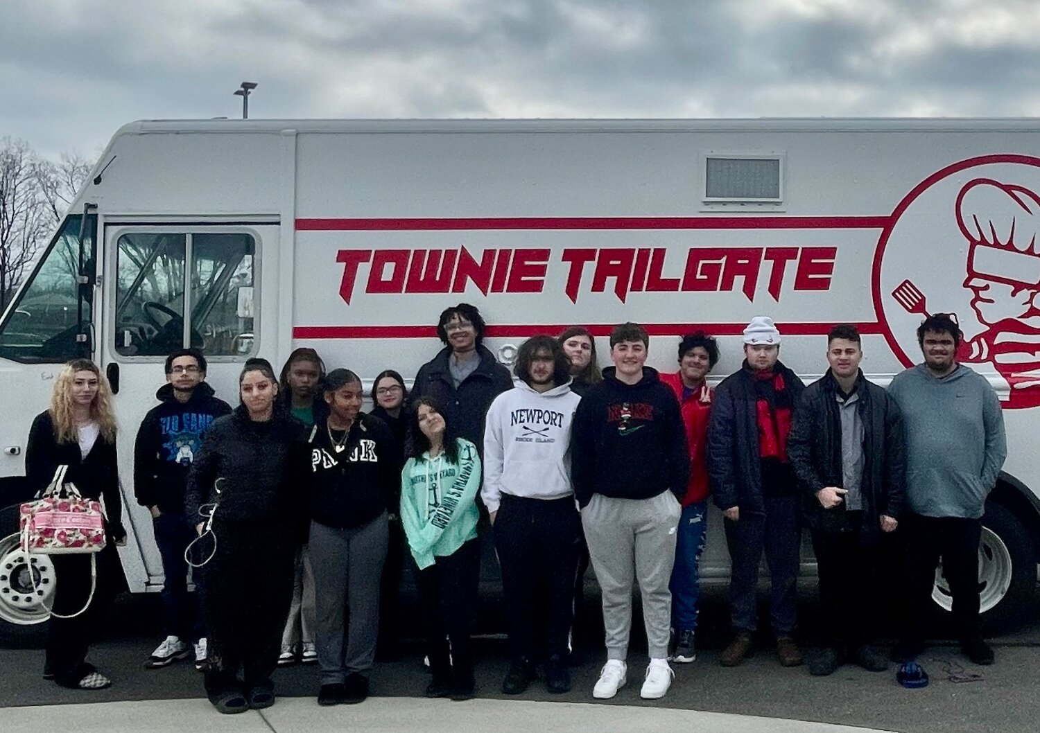 The EPHS Career and Tech Culinary Arts Department students gather in front of their new food truck upon delivery February 1.