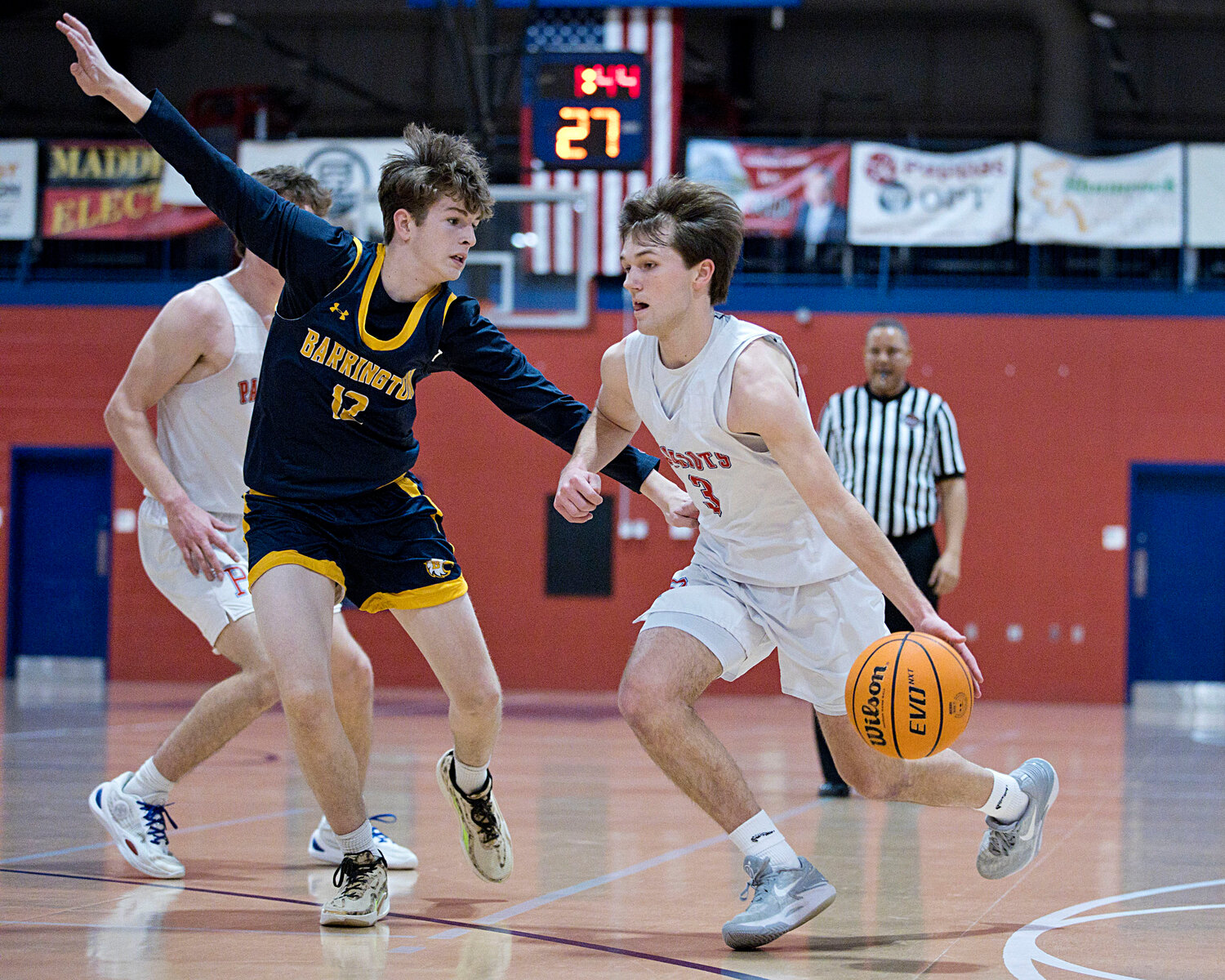 Colin McDermott guards Portsmouth's Adam Conheeny while playing defense for the Eagles.