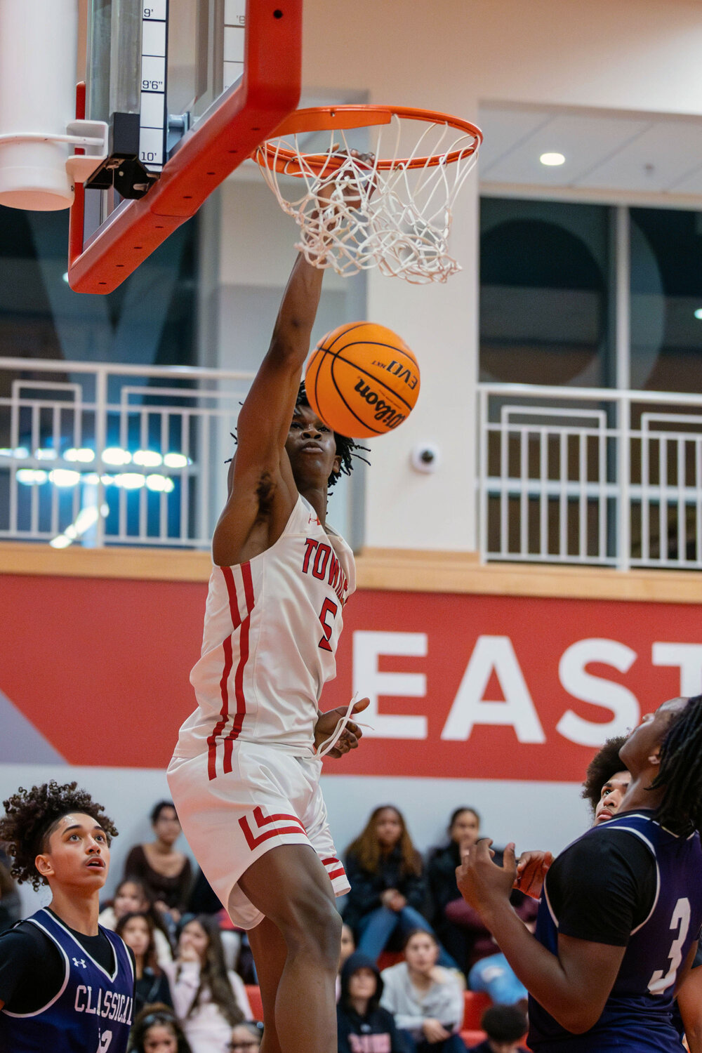 Kenaz Ochgwu dunks during a recent East Providence High School boys' basketball game. Ochgwu and the Townies earned an important road win February 8, rallying from double digits down to defeat host Narragansett.