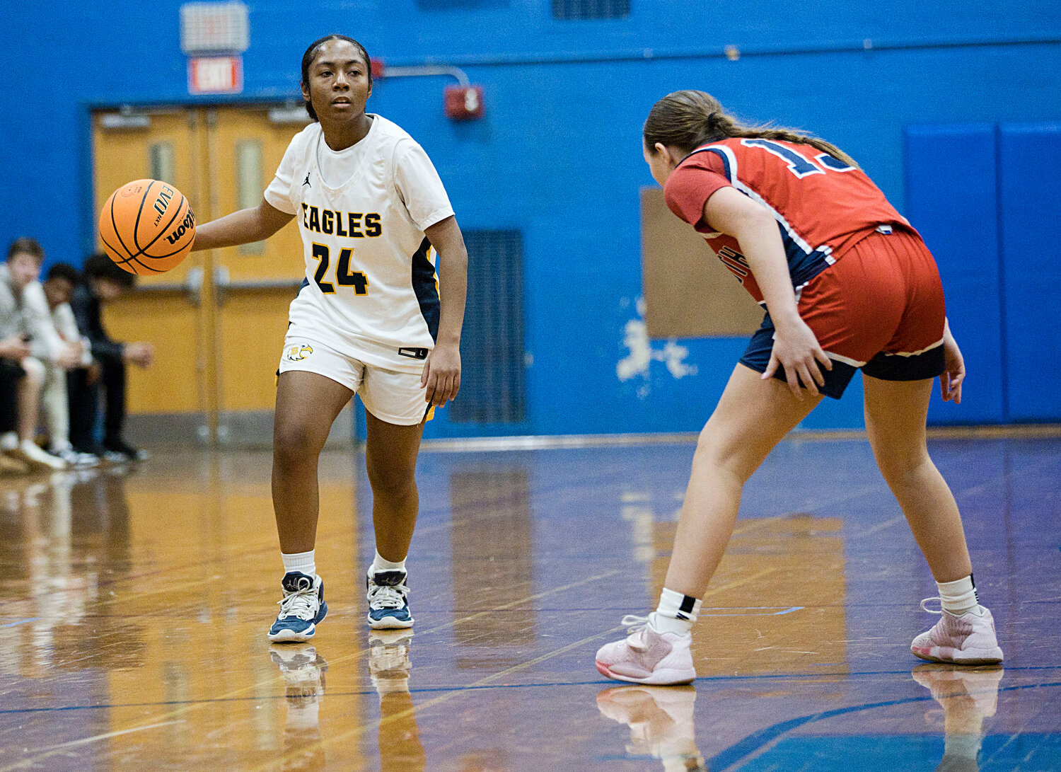 Barrington's Janaya Prince Baquero (left), shown during a home game earlier this season, led the Eagles with 17 points in a double overtime win against North Kingstown.
