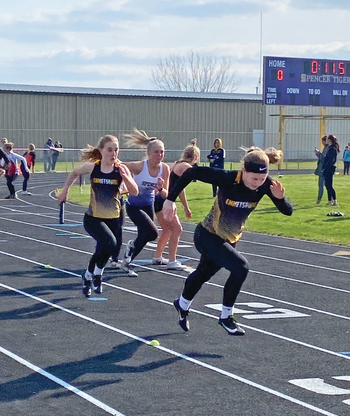 THE CHANGEOVER -- Abbie Schany readies for the handoff during Thursday&rsquo;s relay at the Spencer Invitational. The Lady E-Hawks would earn second place on the day.