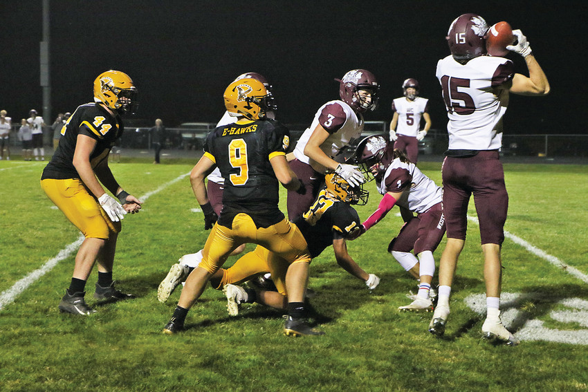 OH SO CLOSE -- With seconds left on the clock and behind by three points, Emmetsburg&rsquo;s Ben Dunlap would find Cade Shirk at the 5-yard line for a 26-yard pass on 4th &amp; 20. Unfortunately, Western Christian would force the ball loose to take possession and the 10-7 win. Pictured (from left) Matt Wirtz, Lex Kassel, and Shirk helplessly watch as the ball comes to rest in Wolfpack arms. The loss is Emmetsburg&rsquo;s first this season.		       -- Joseph Schany photo