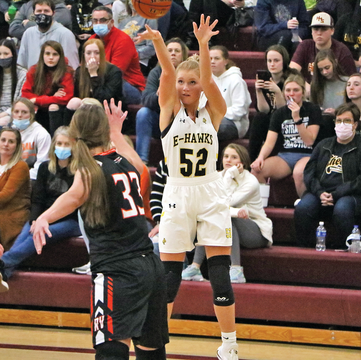 TOUGH DEFENSE -- A tough Rock Valley defense would force the Lady E-Hawks into outside shot attempts throughout the regional championship contest. Pictured, senior Taylor Steinkamp attempts a three-pointer. 
-- Joseph Schany photo