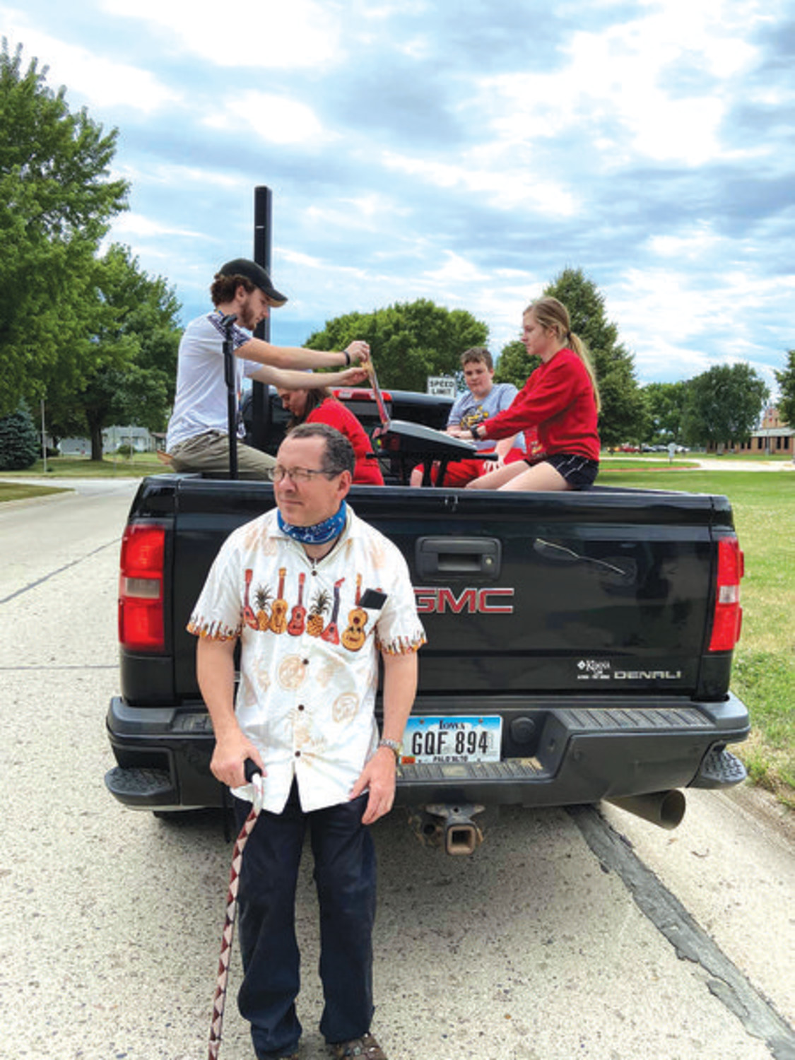 SINGING ROAD TRIP -- Pastor Peter Morlock (front) led the talent parade around Horizons Unlimited homes. Pictured i the truck are?Jonah Morlock, Kristin Reinhart, Jamison Boevers and Gabrielle Janssen.