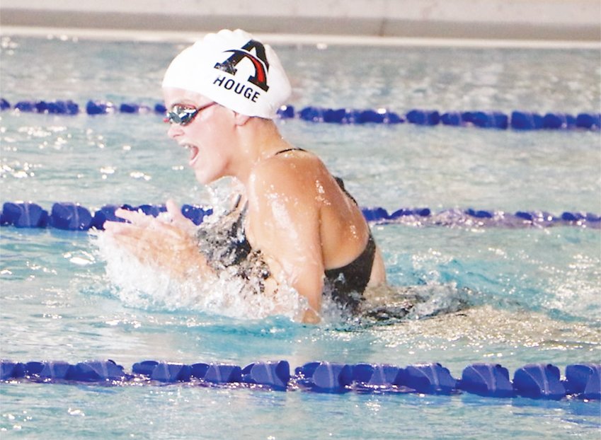 Cathryn Houge competes in the 100 breaststroke at the home meet on Tuesday, Aug. 23 at the Regional Wellness Center in Estherville.  Photo courtesy Lesa Paulson